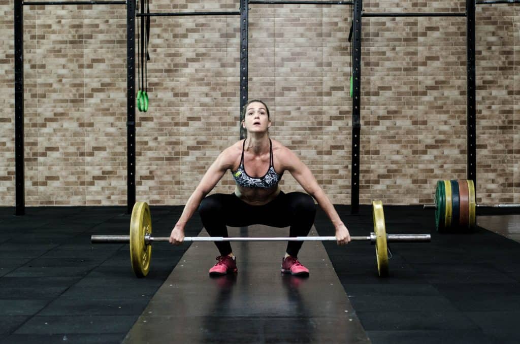 best-free-weight-exercises-003 lifting dumbbell barbell weightlifting