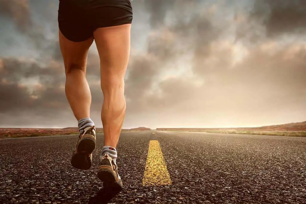 how_fitness_impacts_oral_health_002 Lower body of a muscular man running on a highway