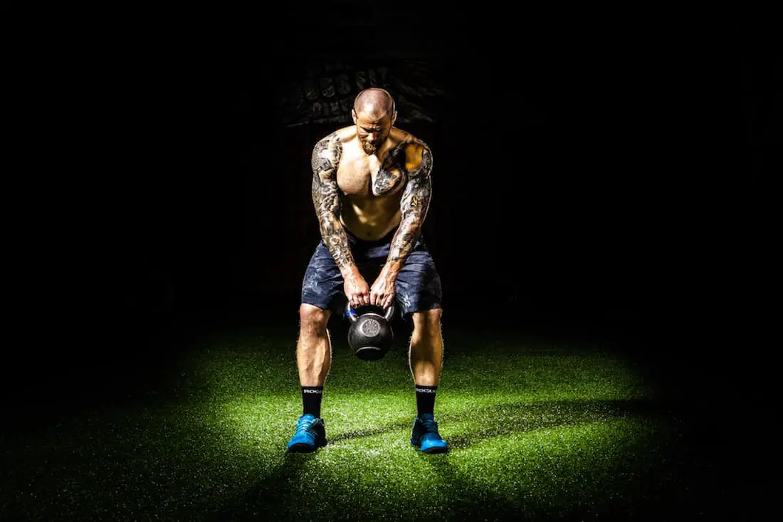 two hand swing for kettlebell shoulder workout
