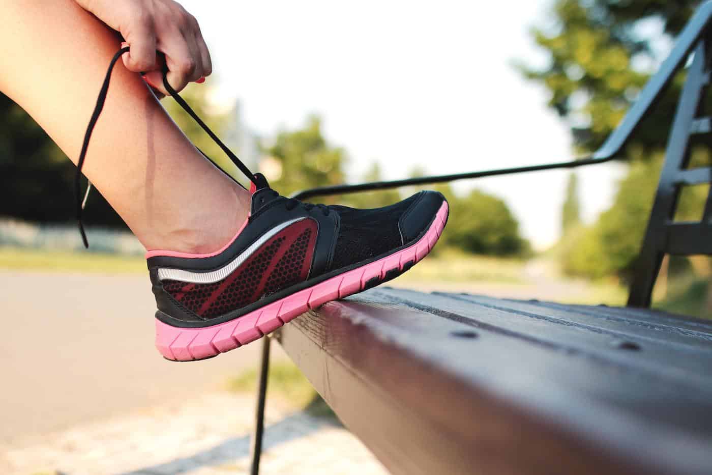 Person tying their shoelaces