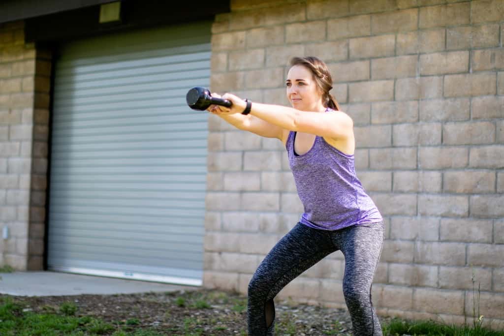 Women doing kettlebell swing