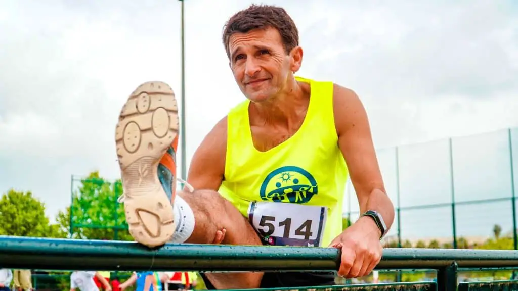 50 year old man stretching