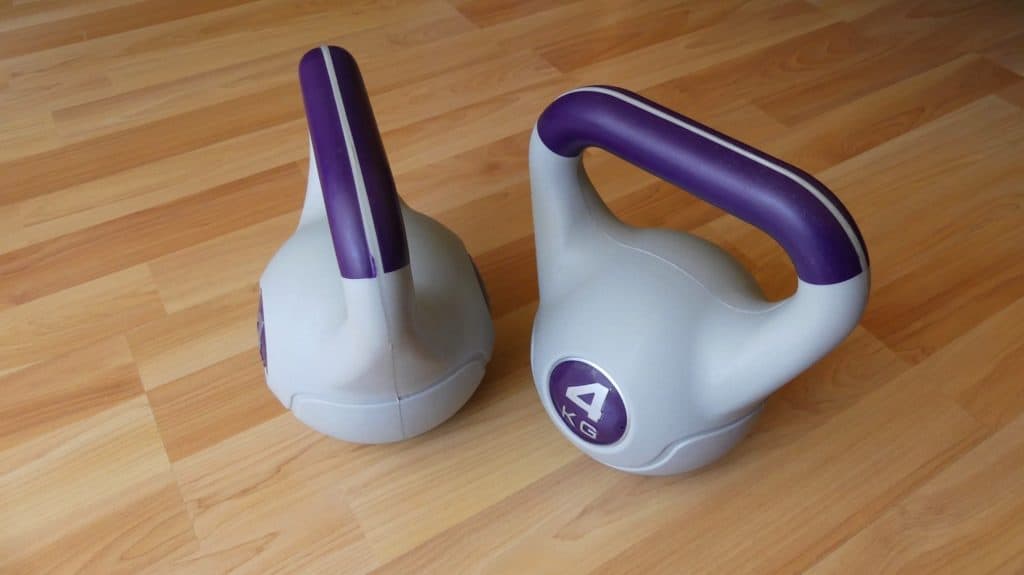A pair of plastic kettlebells