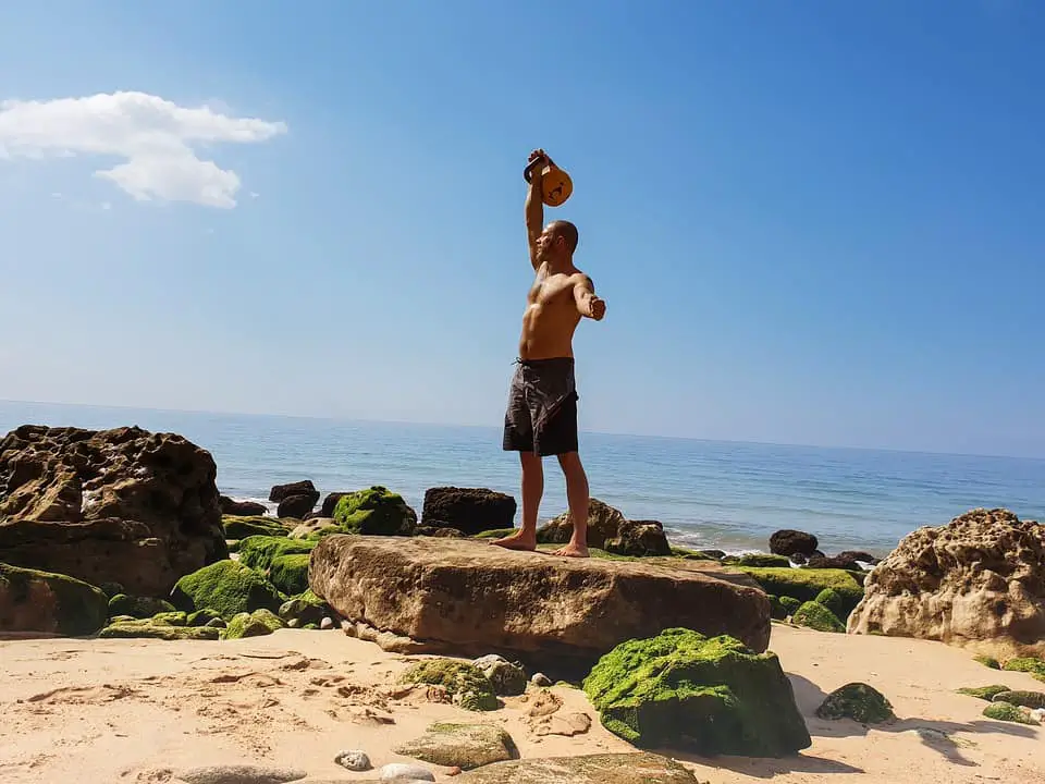 Man lifting a kettlebell