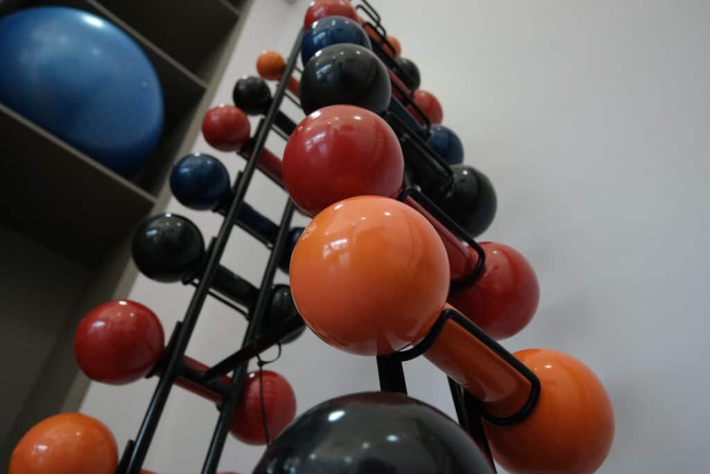 Dumbbells stored upright forming a tower ladder