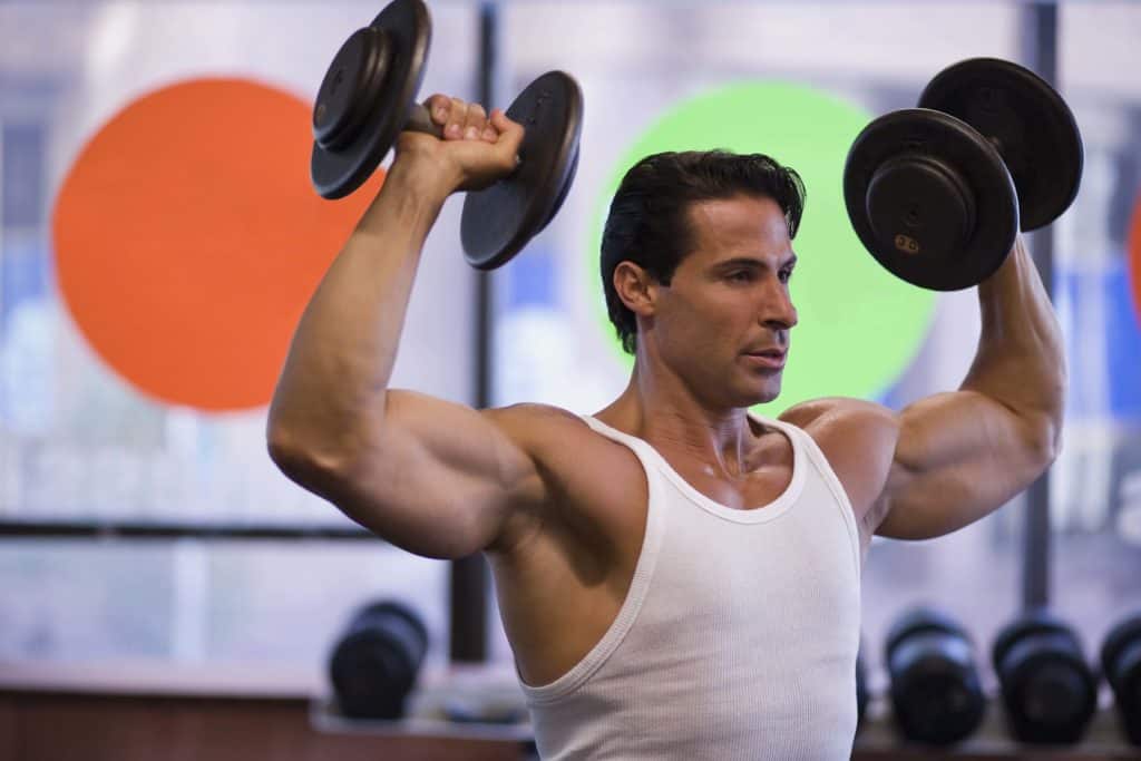 Man performing a dumbbell exercise