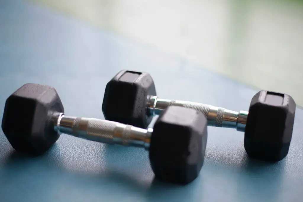A pair of dumbbells on the ground