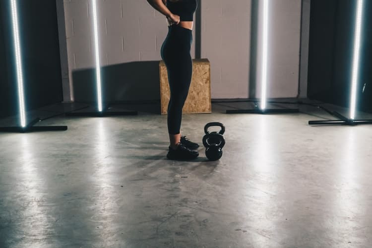 Woman enjoying the benefits of kettlebell swings