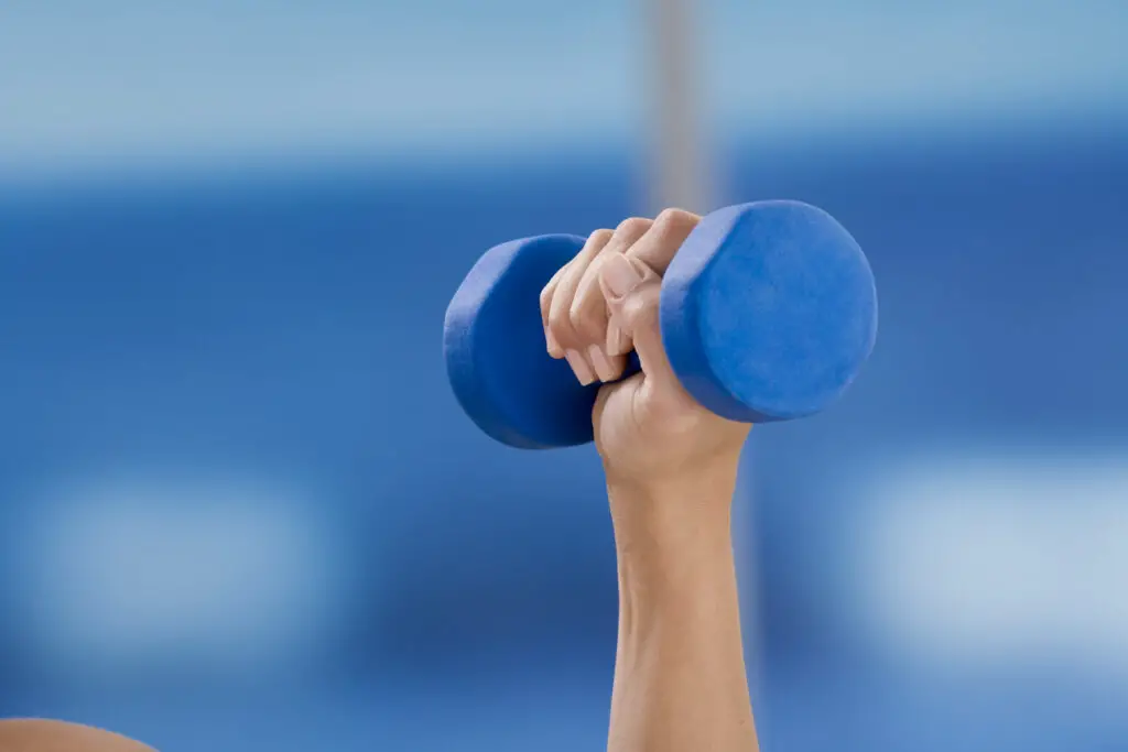 Hand holding a dumbbell