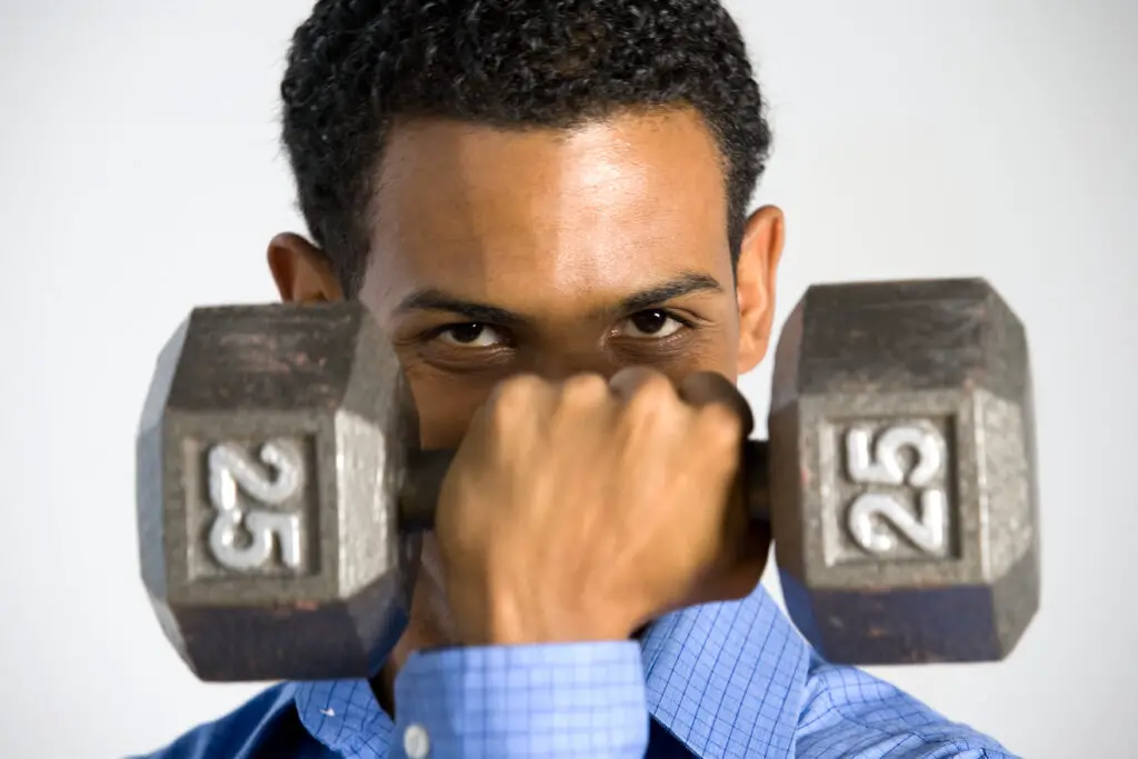 Man wondering if his 25 lb dumbbells are a good fit for him