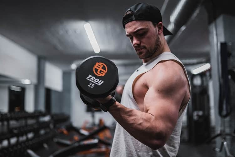 Man lifting a dumbbell with one hand