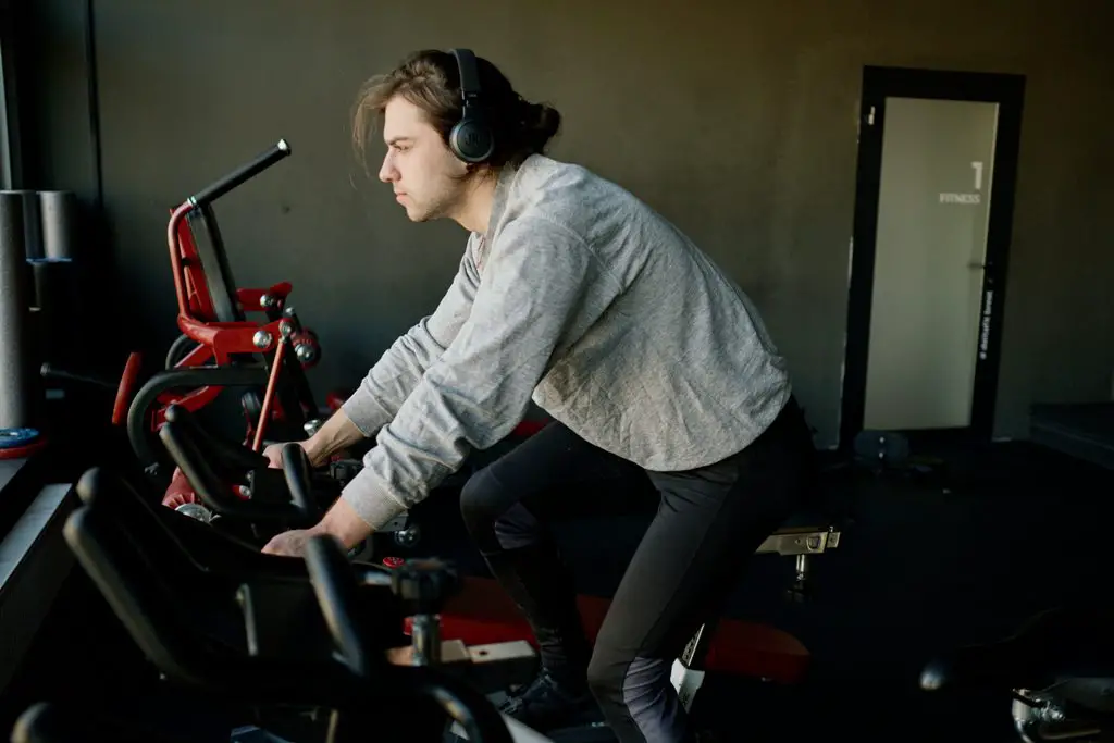 Man using a folding exercise bike