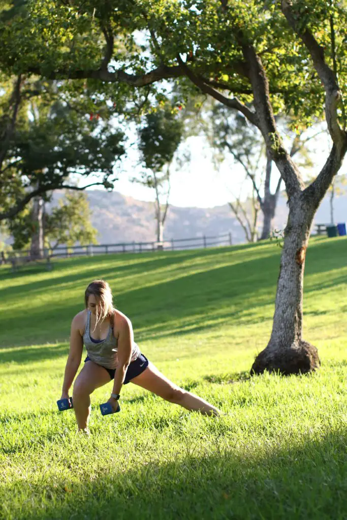 Woman performing dumbbell exercises