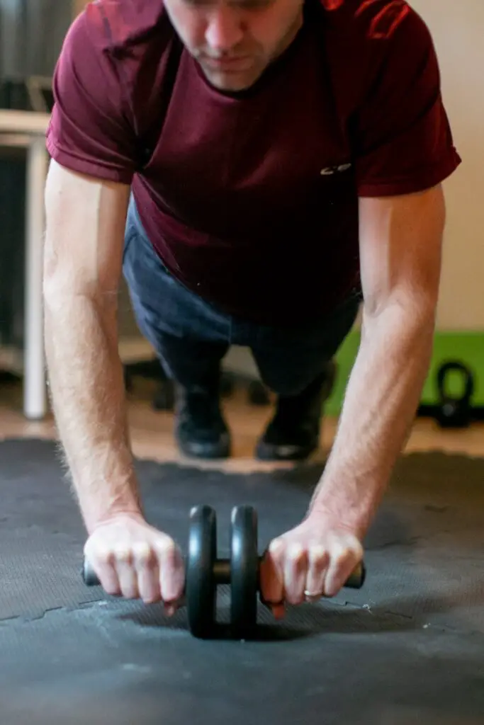 Man using an ab roller