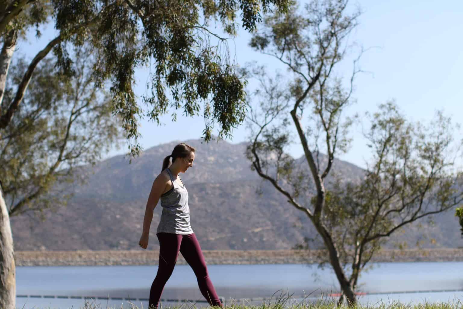 Woman doing calisthenics outdoors