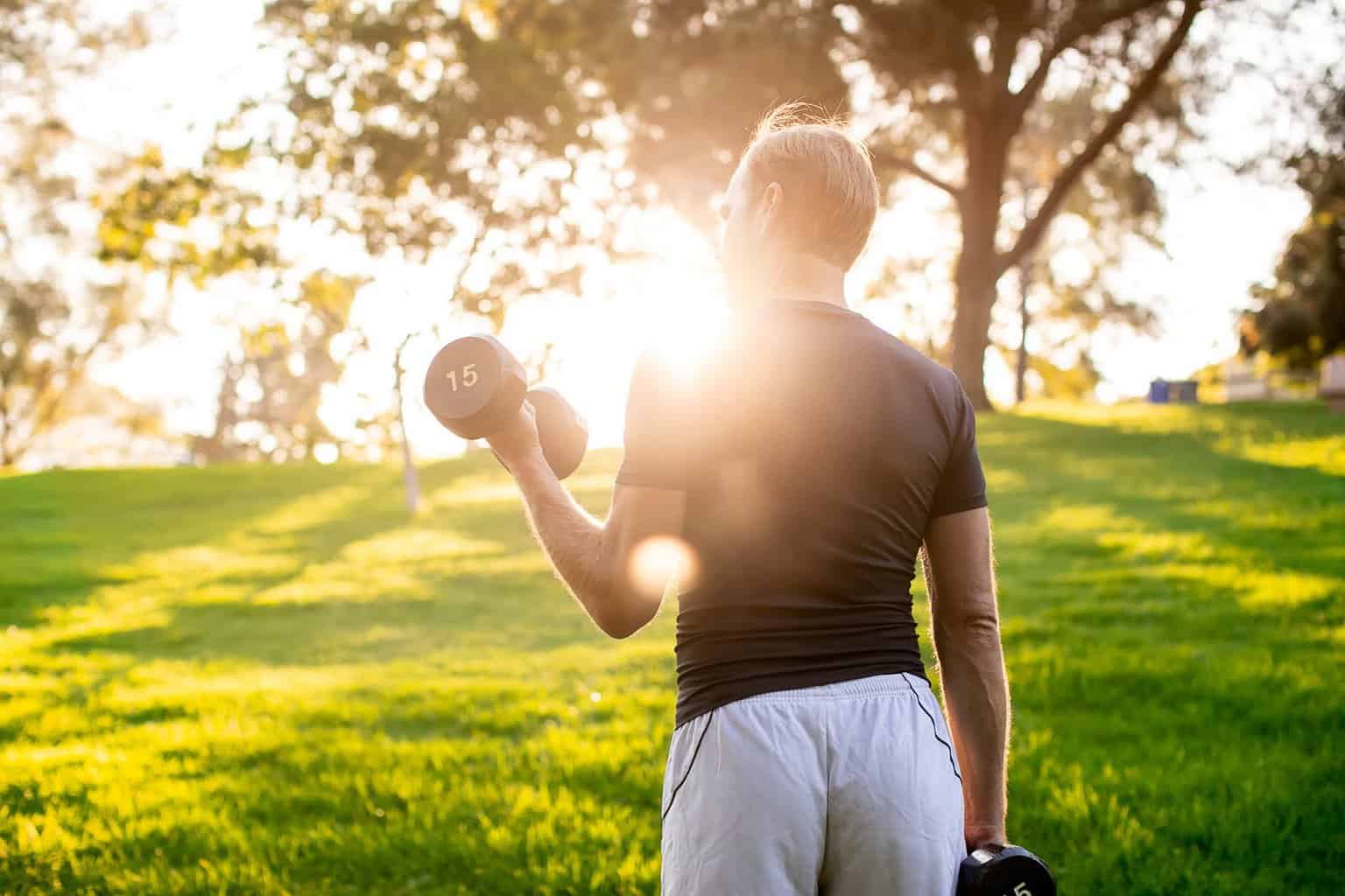 Man curling a dumbbell with one hand