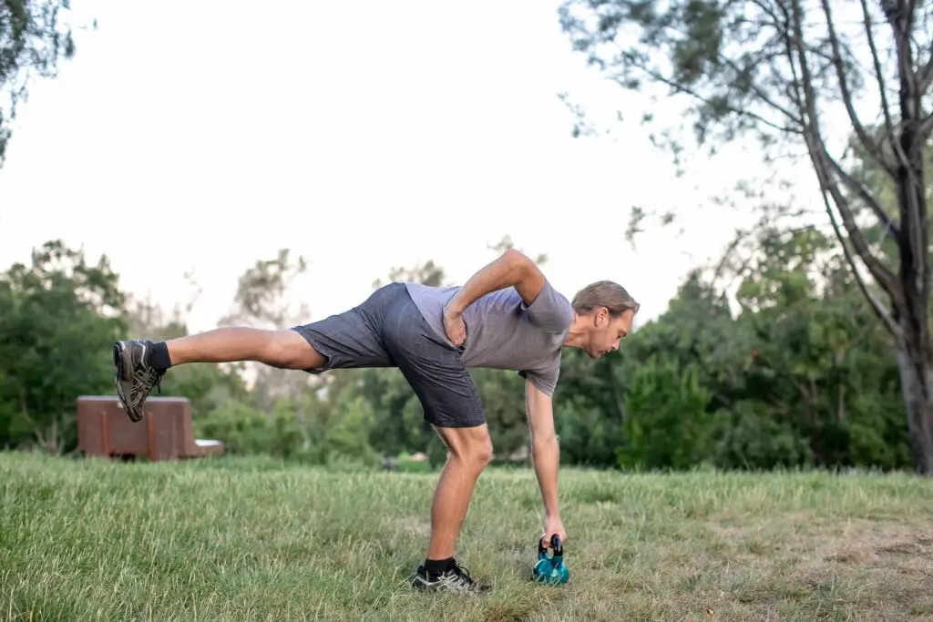 Man doing kettlebell exercises