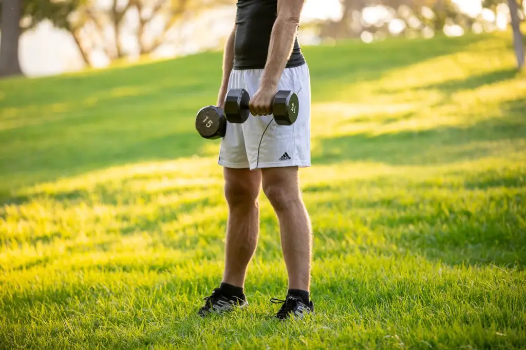 Man holding a dumbbell with each hands