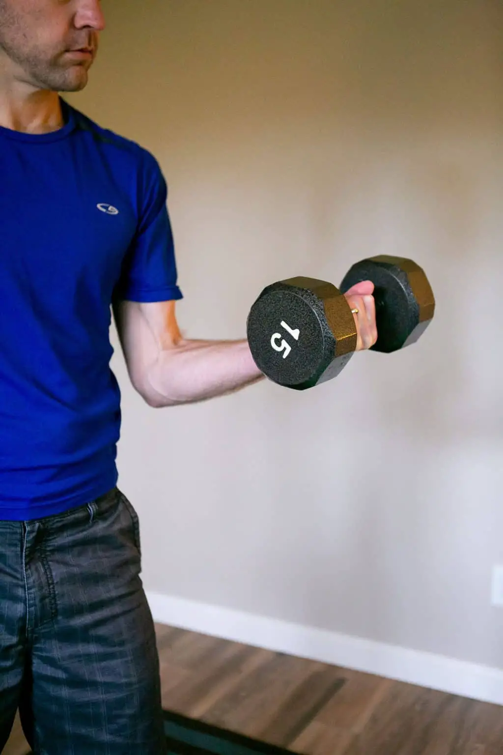 A man doing bicep curl exercises