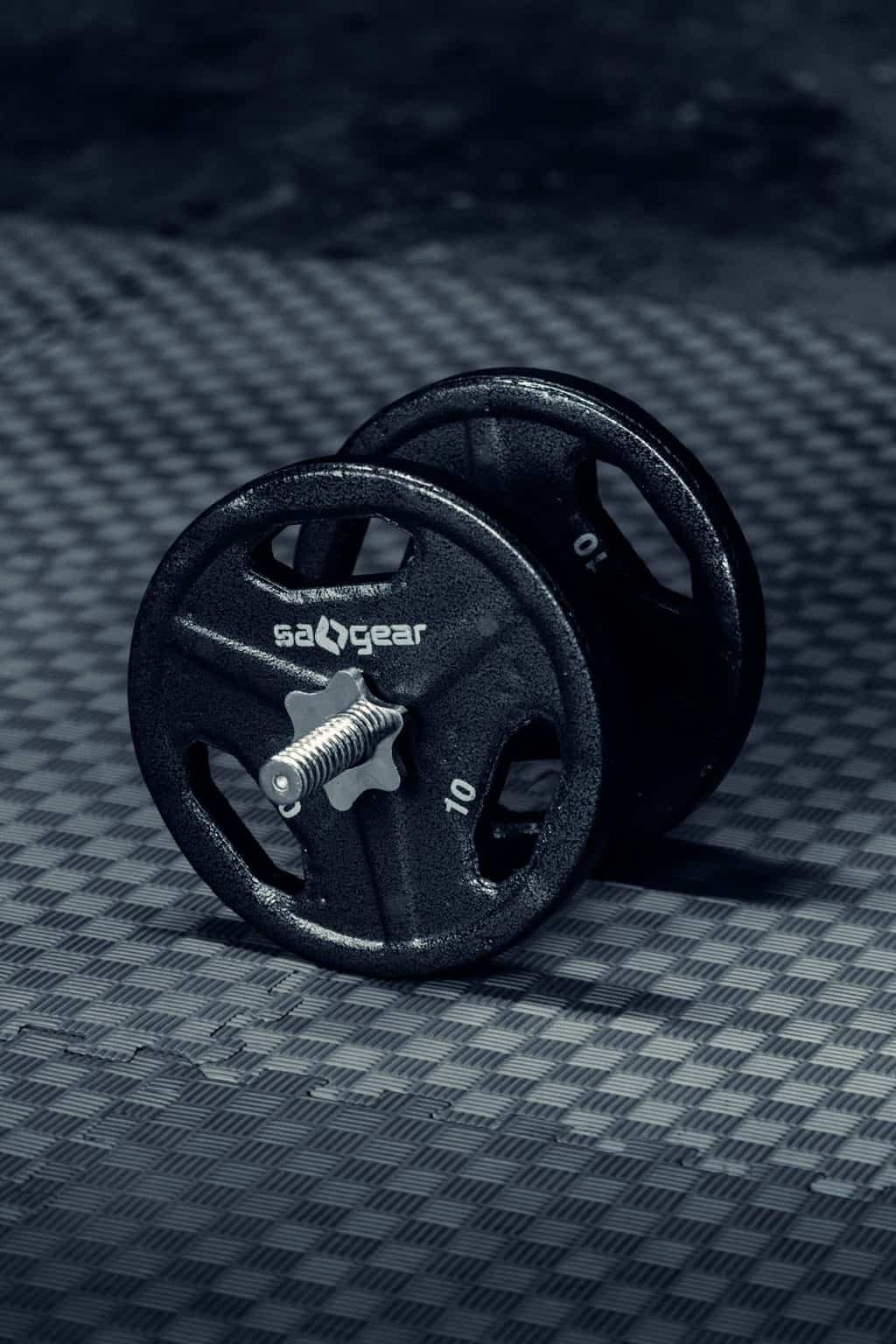 Dumbbell on a rubber mat