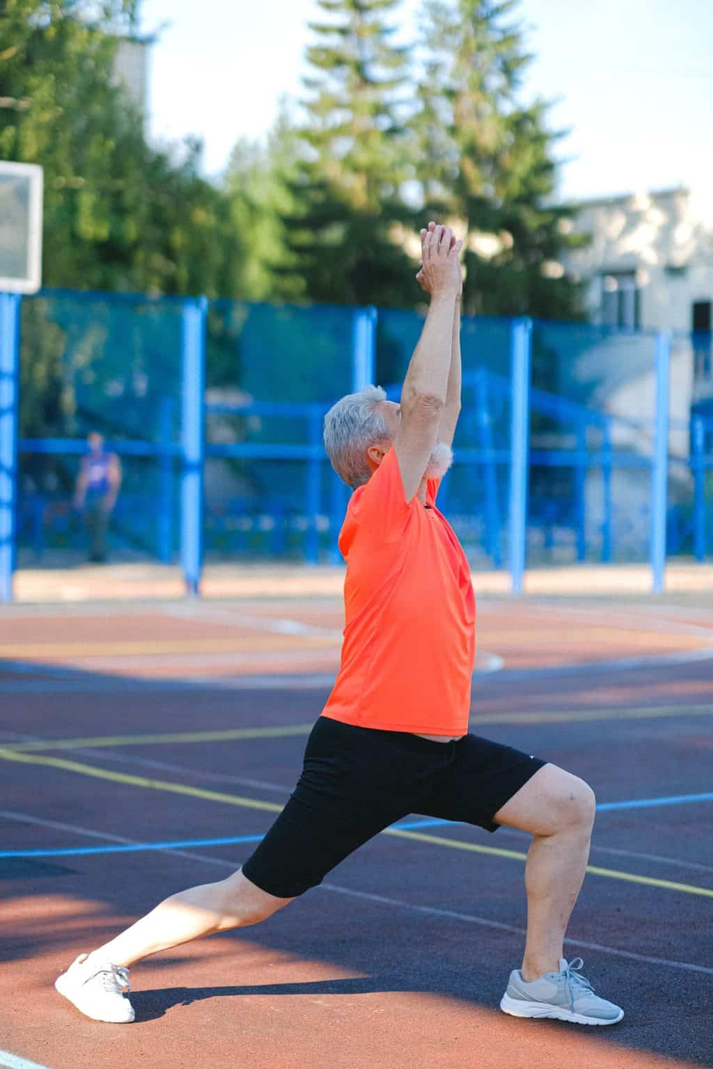 A senior man doing stretches